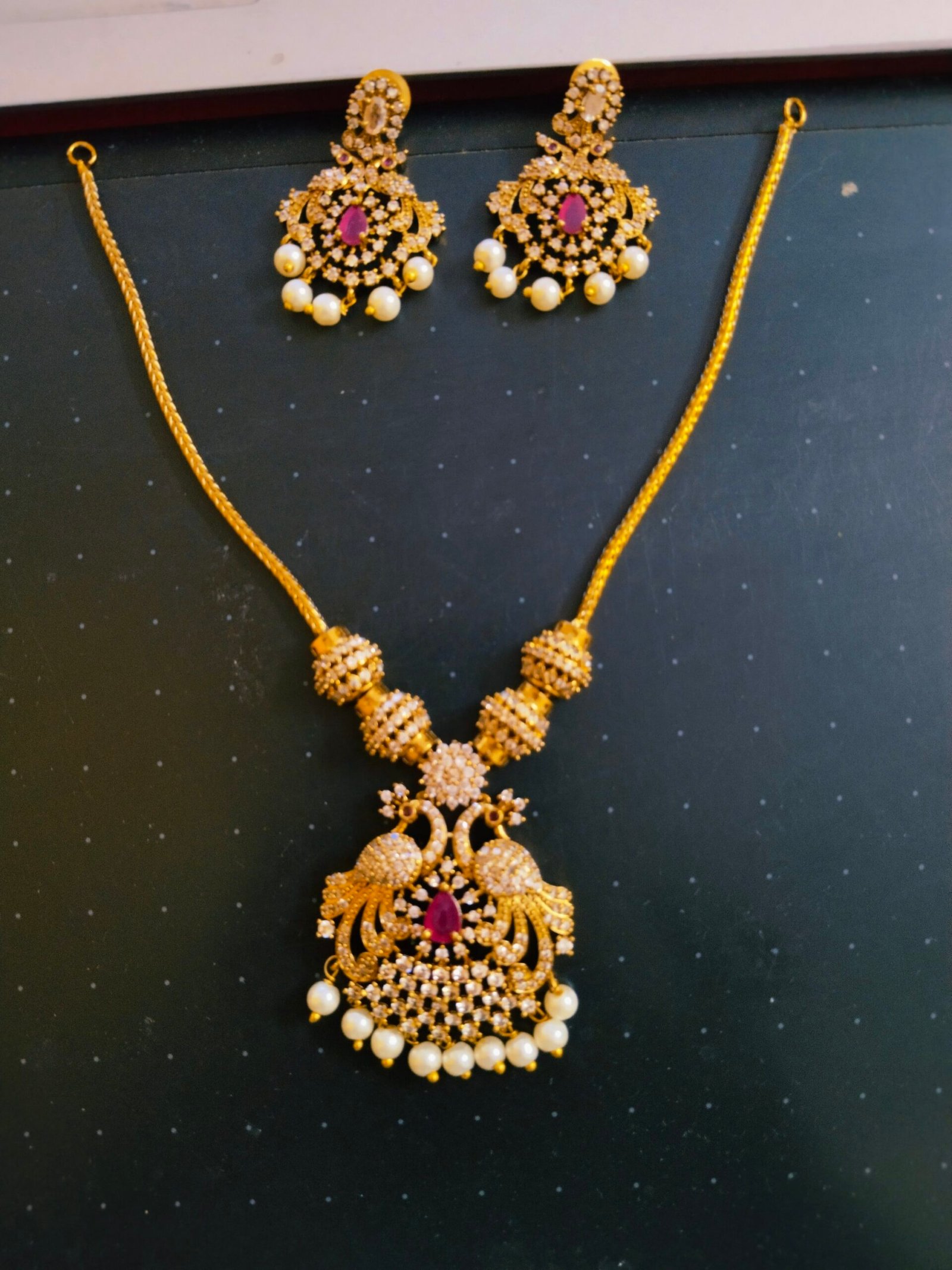 2025/10/1000167983-scaled.jpg Traditional Nanu patti with earrings - Image 1