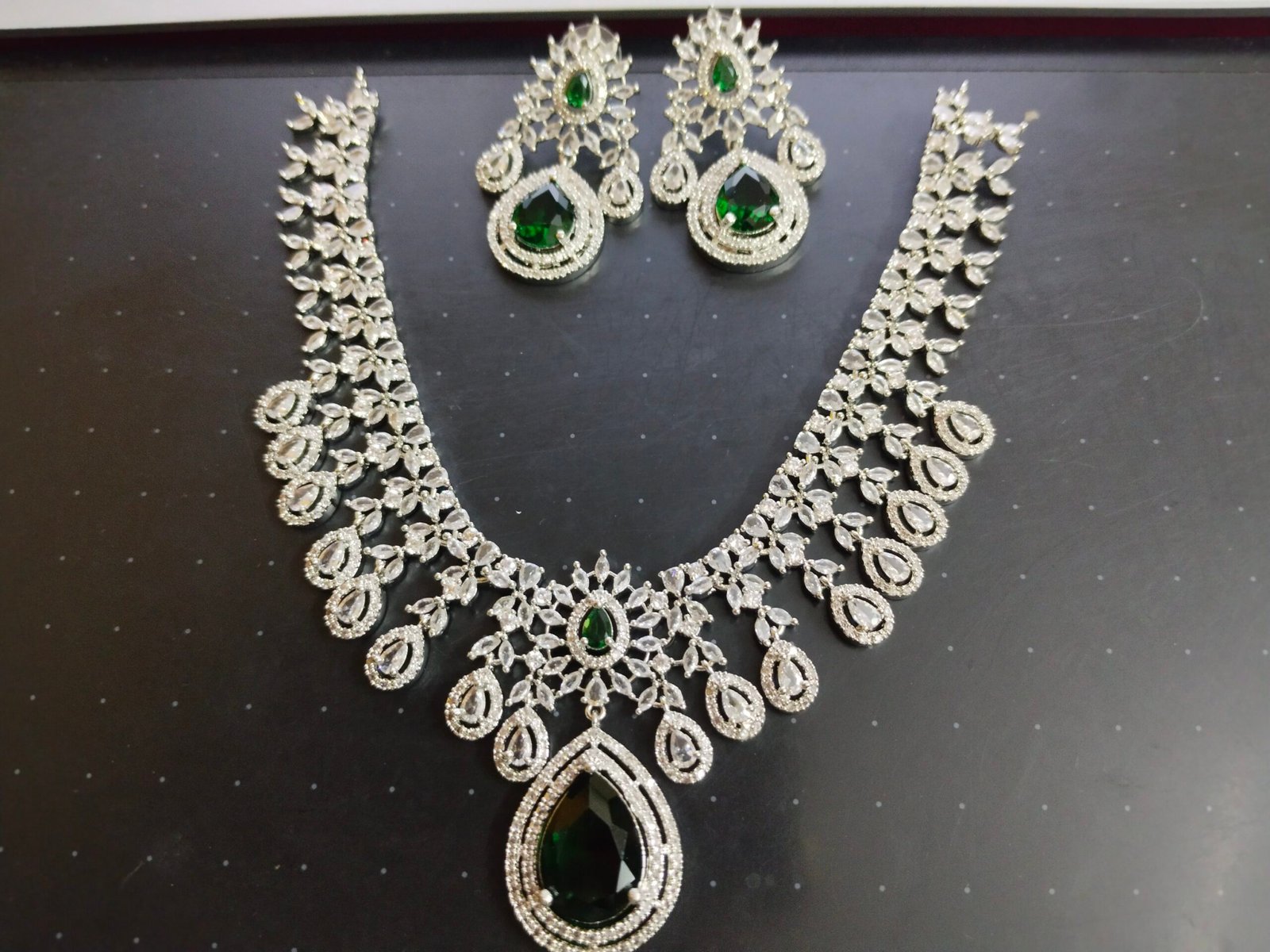 2025/10/1000170006-scaled.jpg Green Stone American Diamond necklace set with earrings - Image 1